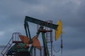 An oil well pump in the ÃÂeletovci, Croatia. Pumpjack.CR2 Royalty Free Stock Photo